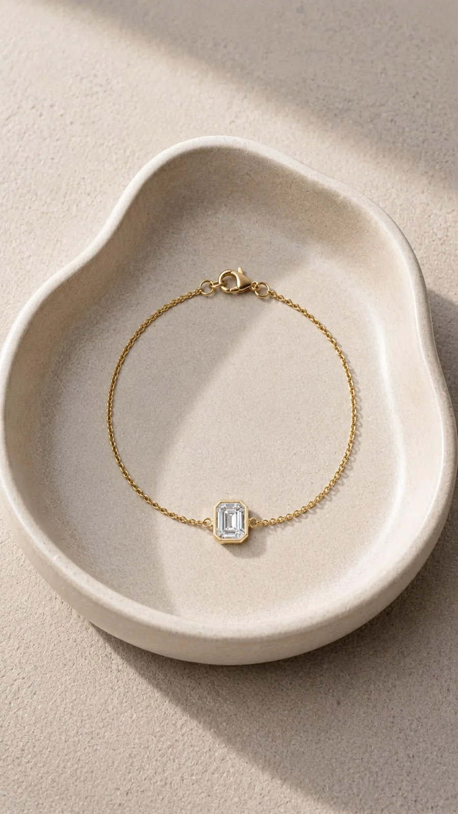 Emerald cut lab grown diamond single stone bracelet in 14K gold