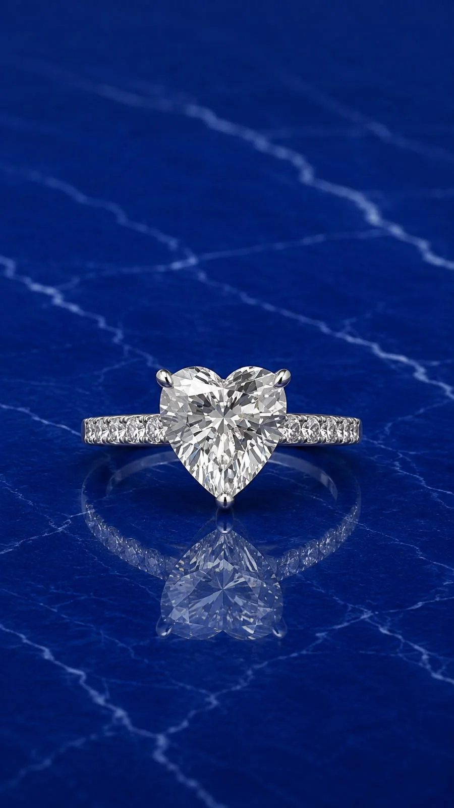 Heart-cut lab grown diamond ring with classic pave band