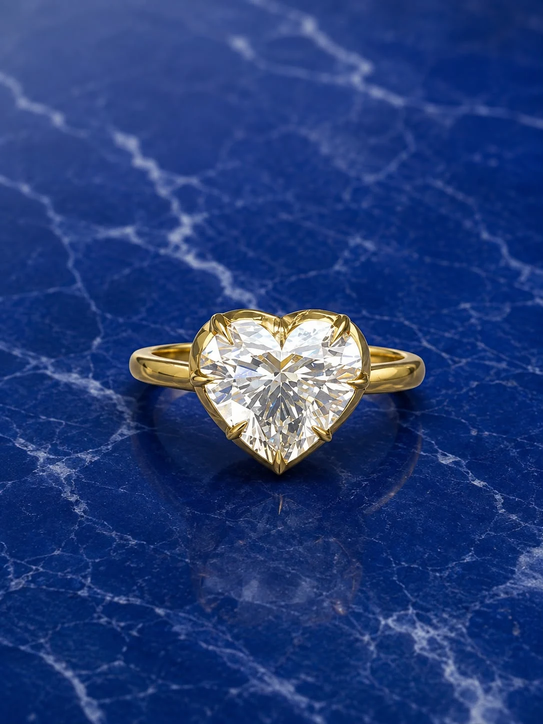 Heart crown solitaire engagement ring with a heart-cut lab grown diamond center
