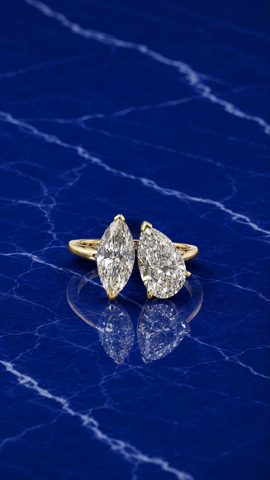 Toi et moi engagement ring pairing marquise and pear cut lab grown diamonds