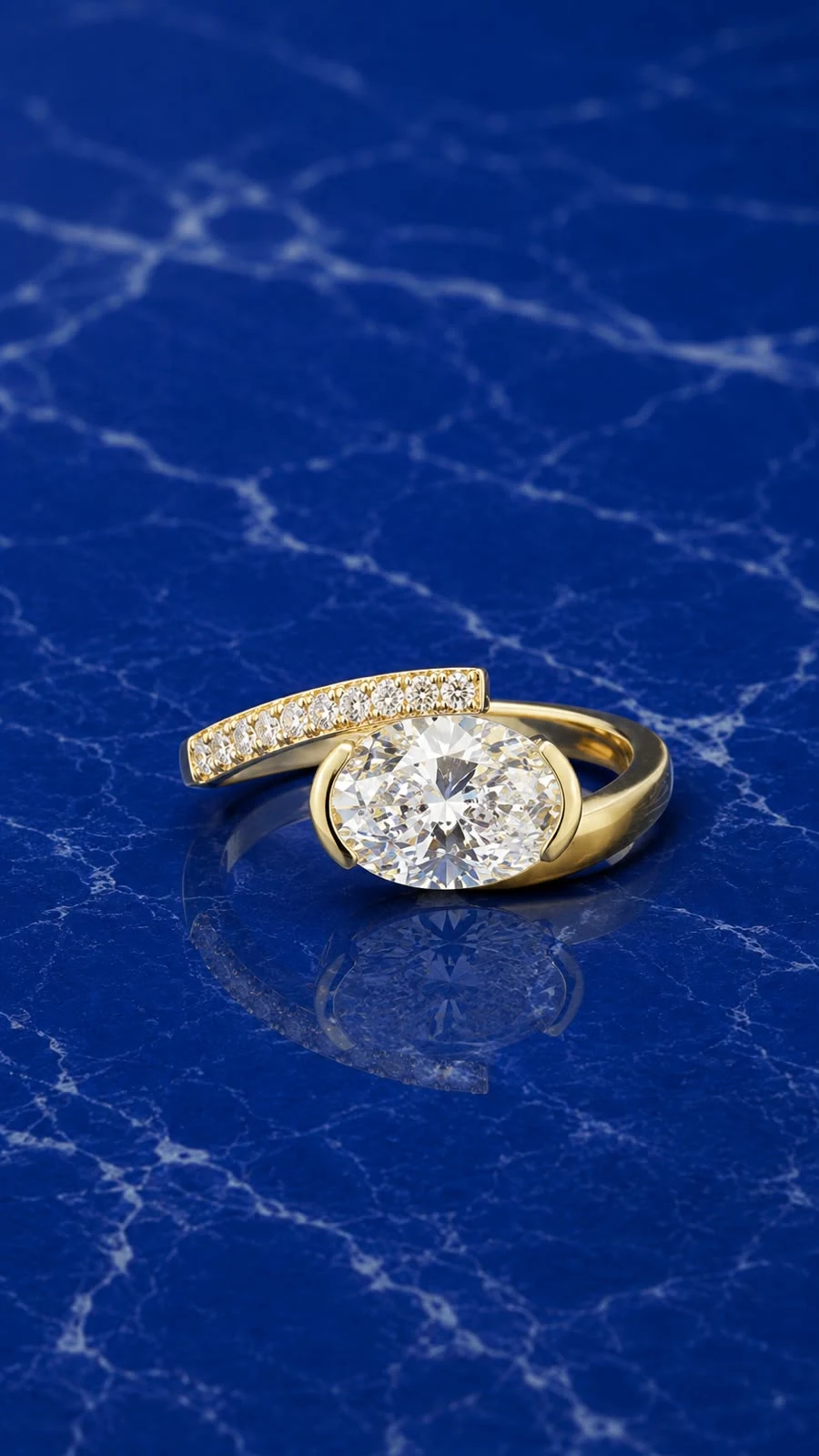 Oval pave band engagement ring featuring an oval-cut lab grown diamond center stone