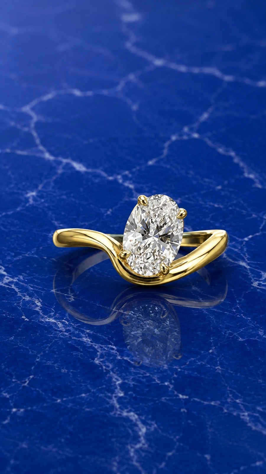 Oval swirl engagement ring featuring an oval-cut lab grown diamond center stone