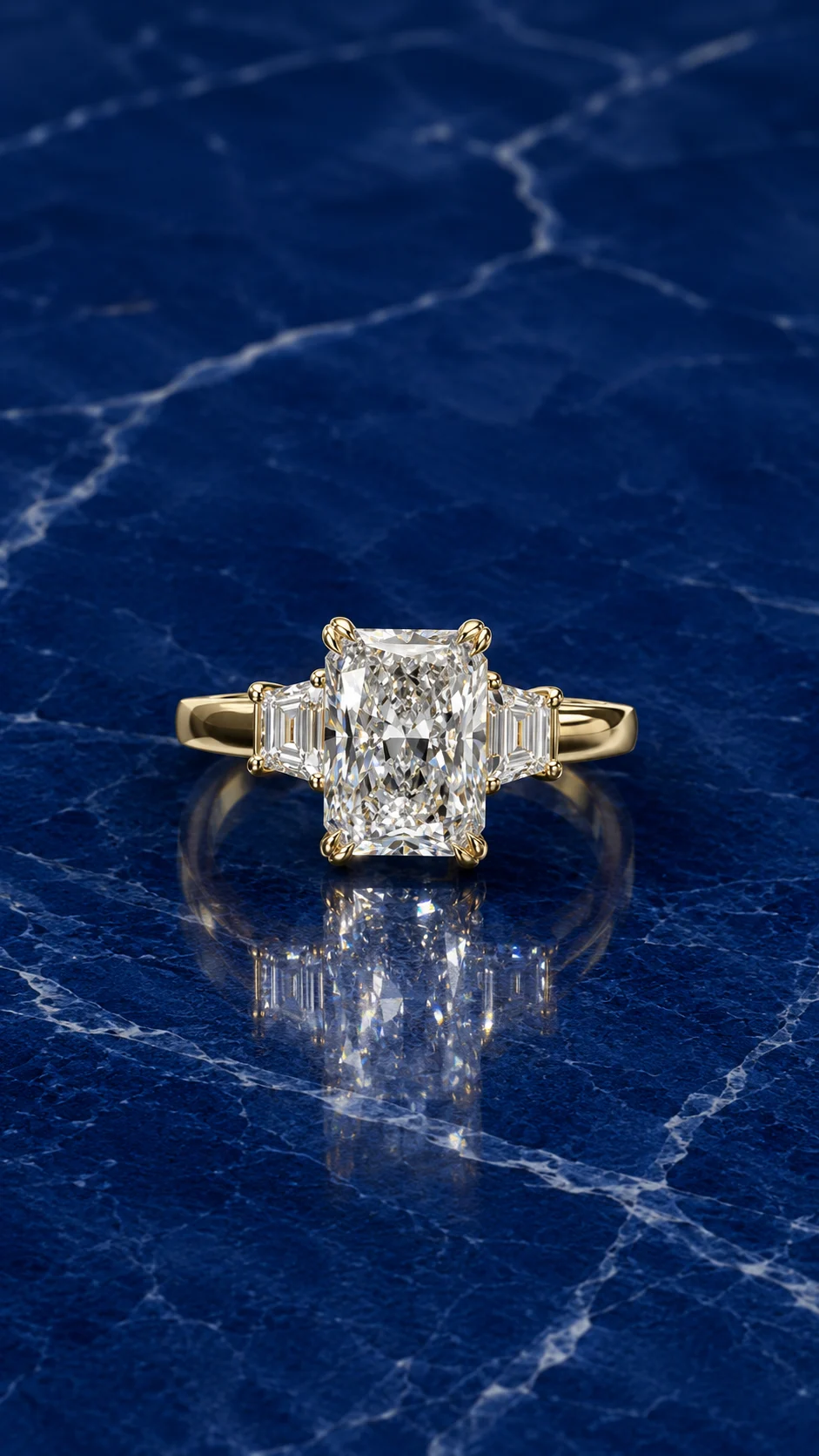 Three stone engagement ring with a radiant cut lab grown diamond center and trapezoid side diamonds