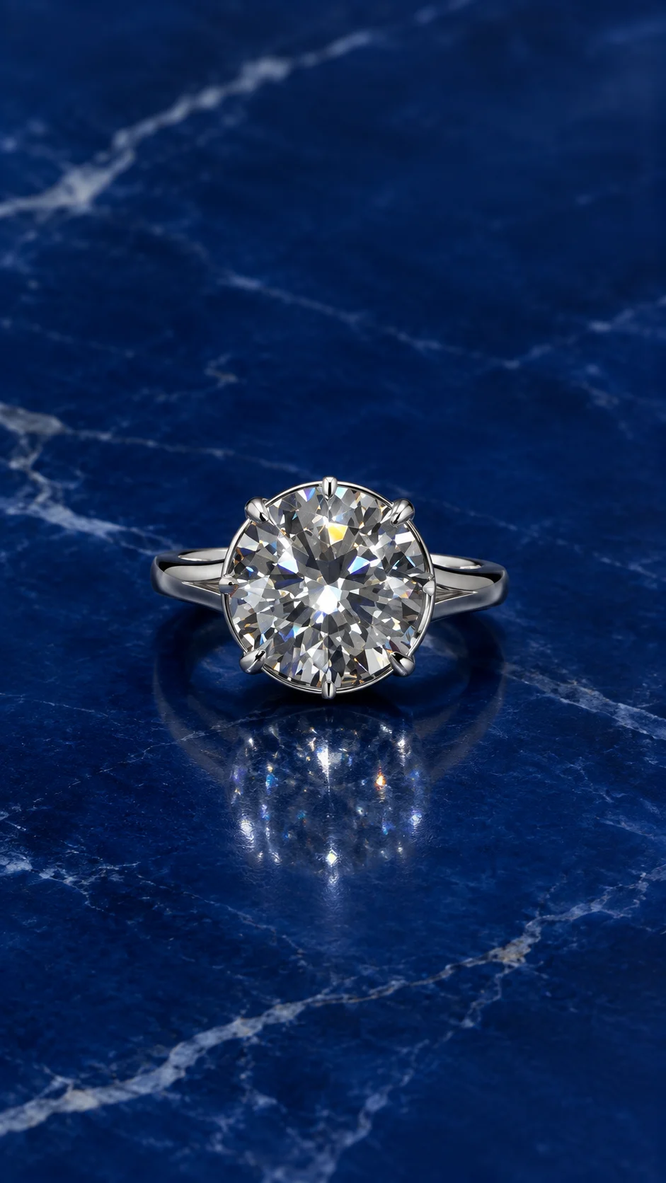 Round crown solitaire engagement ring with a round-cut lab grown diamond center