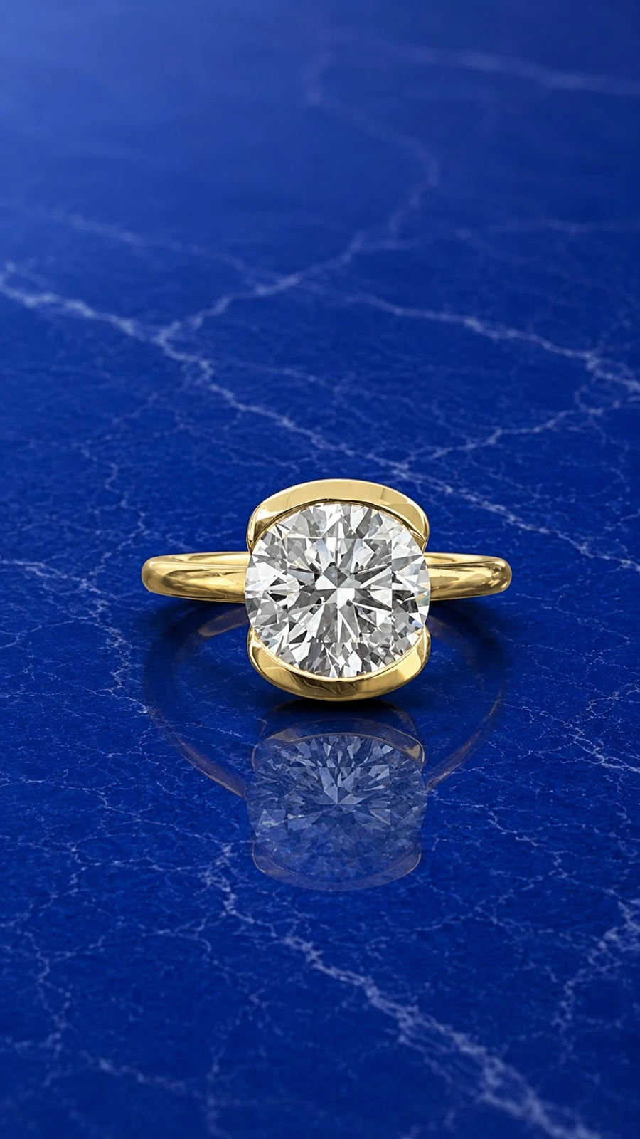 Round half bezel set engagement ring with a round-cut lab grown diamond center