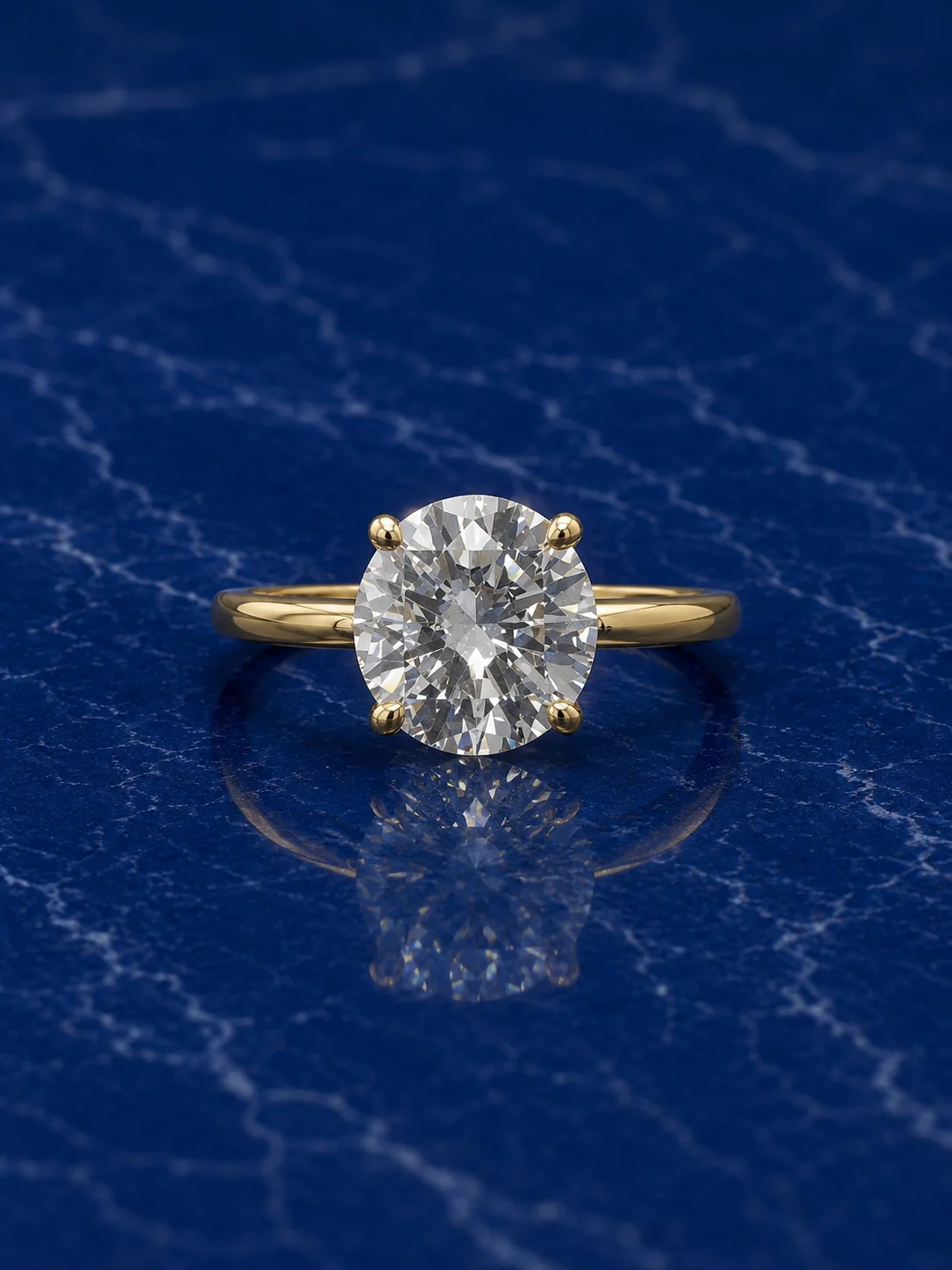 Classic round solitaire engagement ring with a brilliant-cut lab grown diamond center